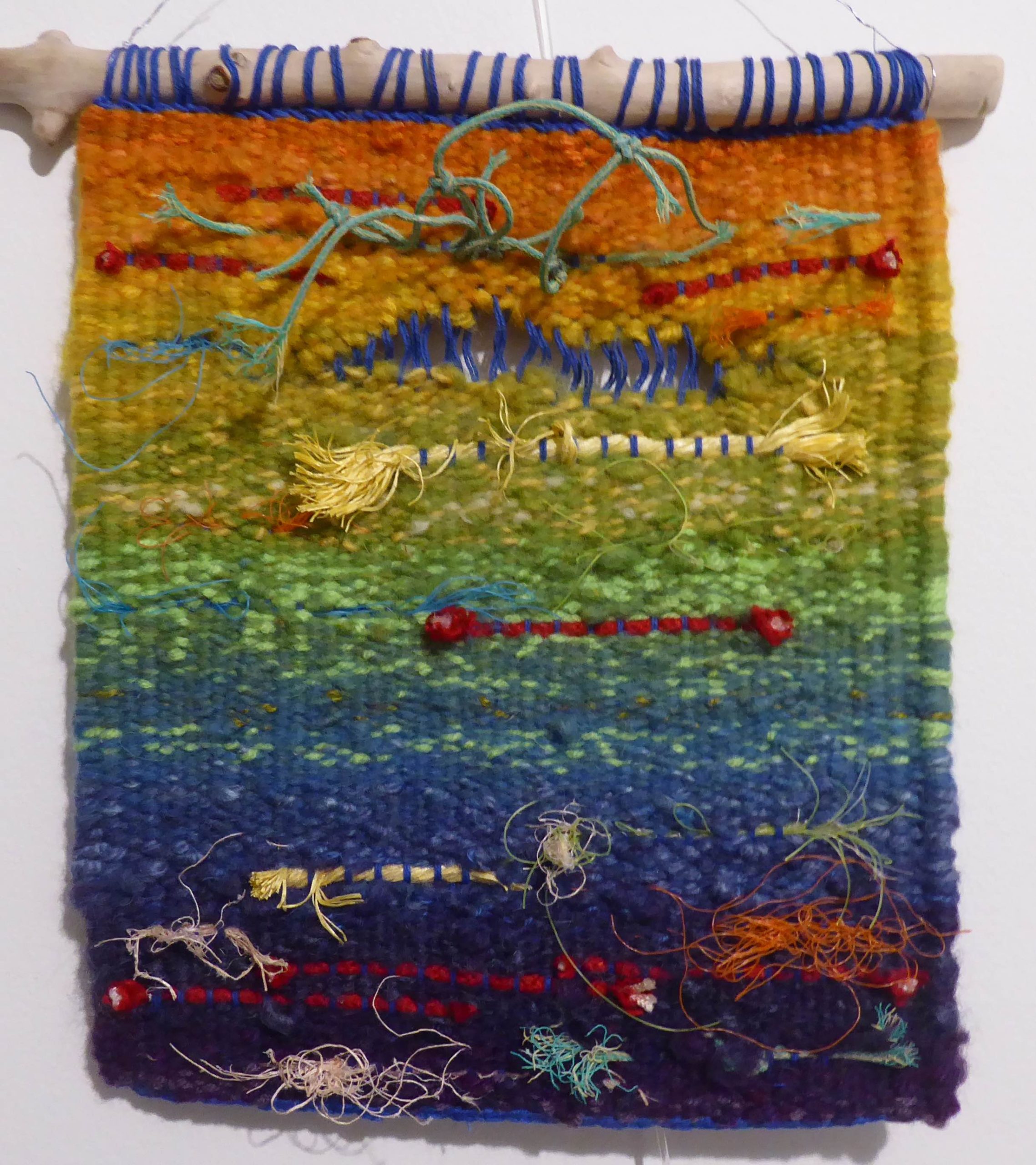 Walking on the beach I notice plastic pollution; food and drink packaging, nets and rope from fishing vessels. I pick it up and either recycle or use it in my art work, such as the environmentally themed woven series.